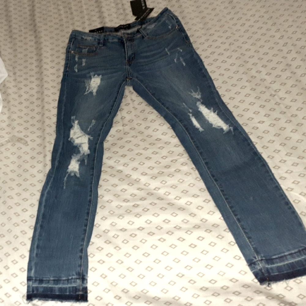 Fashion nova mid rise medium wash distressed jeans